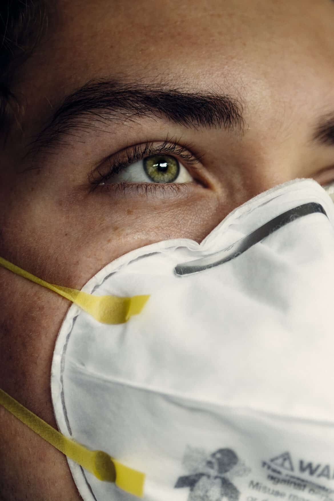 person-wearing-white-face-mask-stockpack-pexels Person wearing white face mask