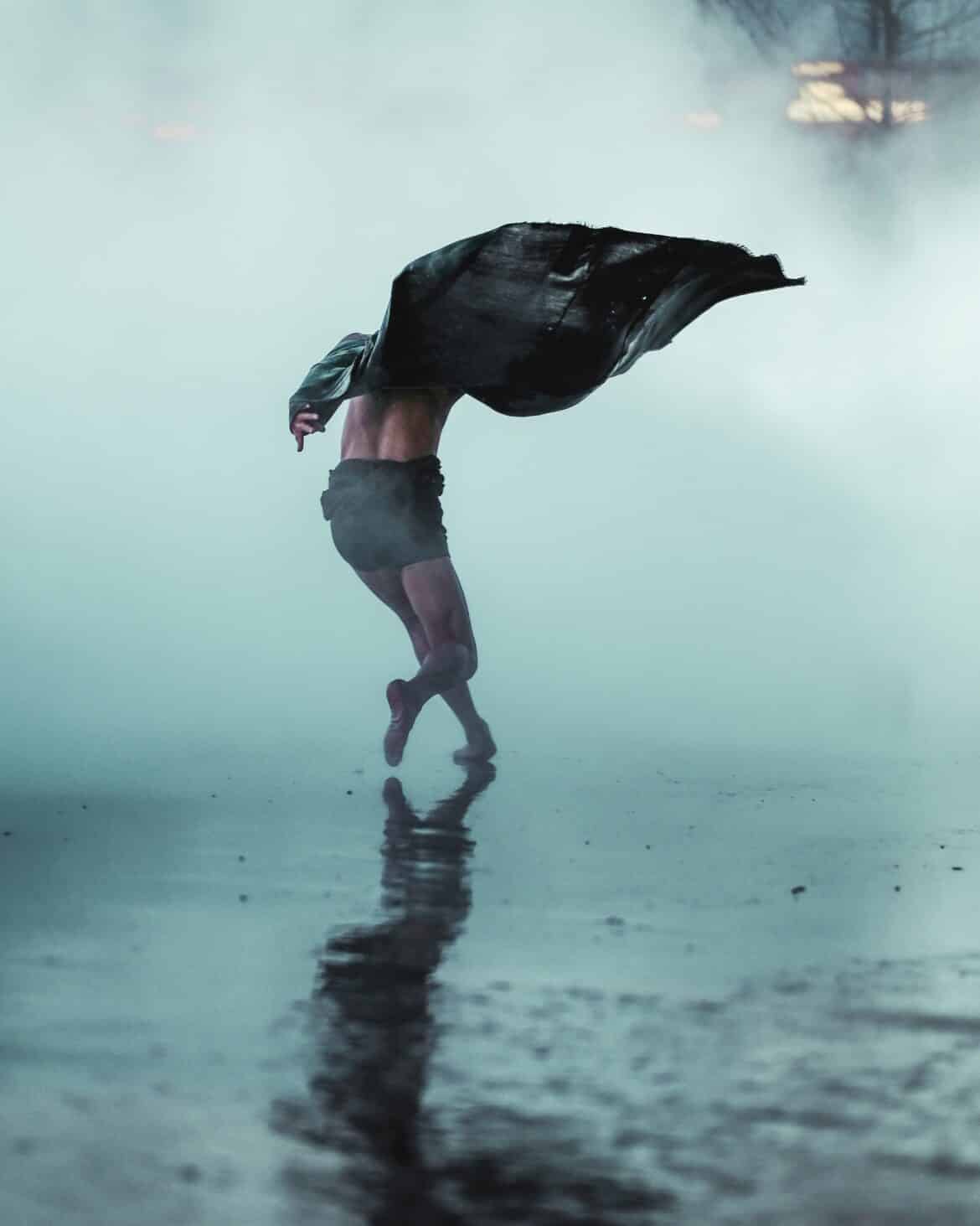 a-performer-dances-in-the-fog-installation-at-the-tate-modern-during-the-recent-tate-live-stockpack-unsplash a performer dances in the fog installation at the Tate modern during the recent Tate live.