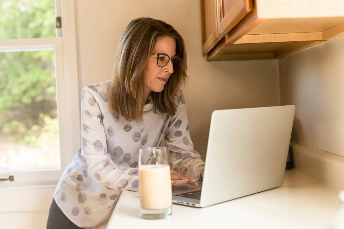 woman-using-her-macbook-pro-inside-white-room-stockpack-unsplash woman using her MacBook Pro inside white room